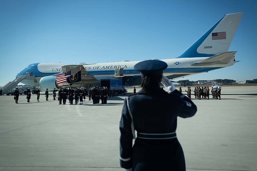 President Carter's casket is loaded onto aircraft.