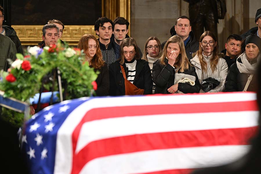Members of the public pay respects