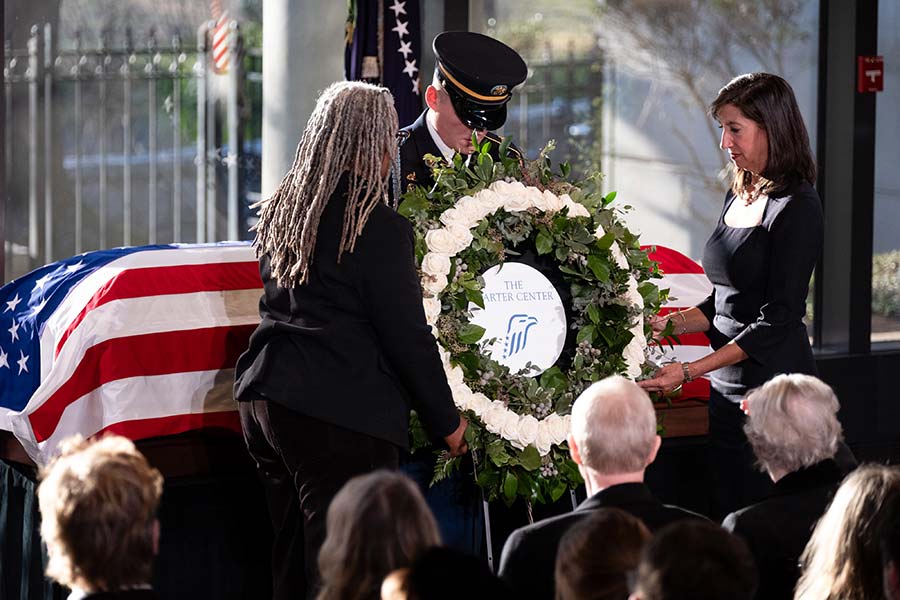 Leaders lay a wreath.
